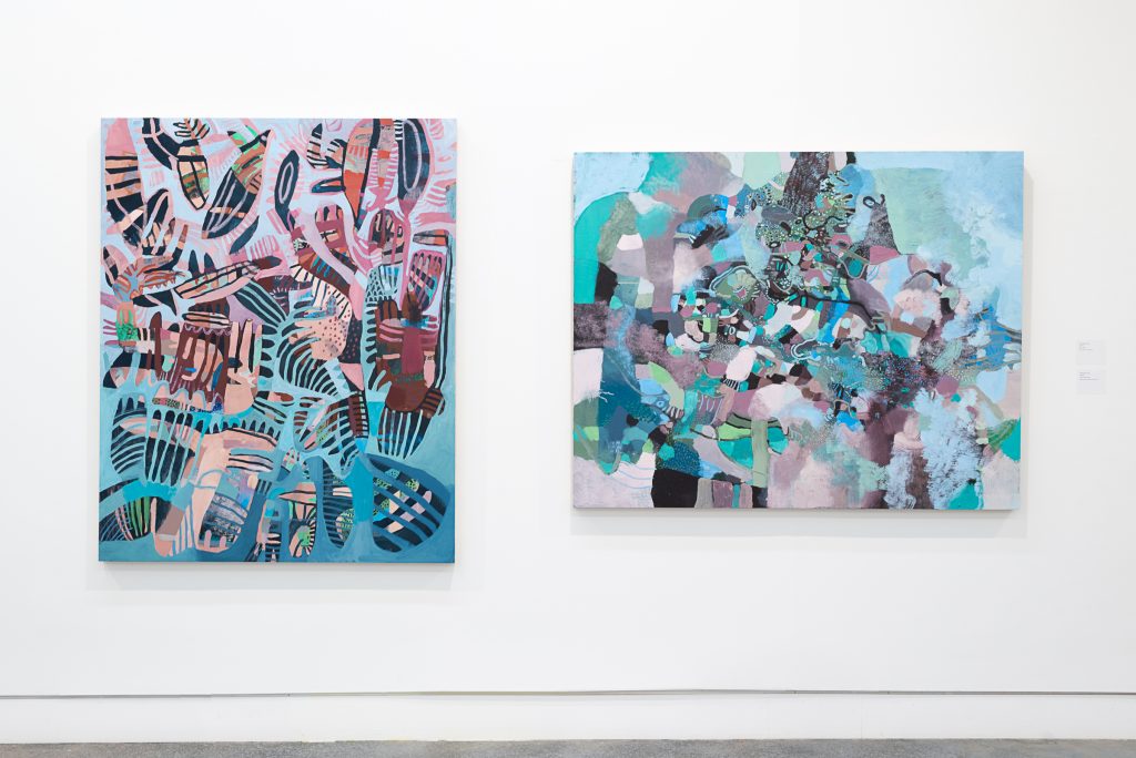 Two abstract paintings in shades of periwinkle, lavender, and teal depicting overlapping textures and patterns. 
