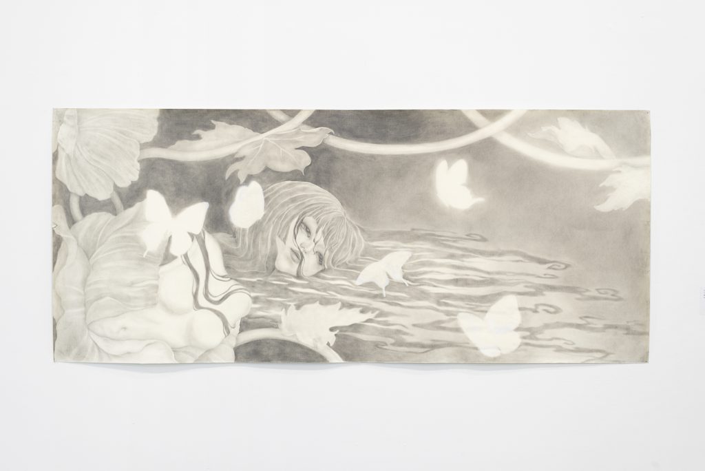 Gray pencil drawing on cream-paper of a nude female figure laying in water with hair draped across the water; a canopy of leaves and glowing white butterflies dangles above. 